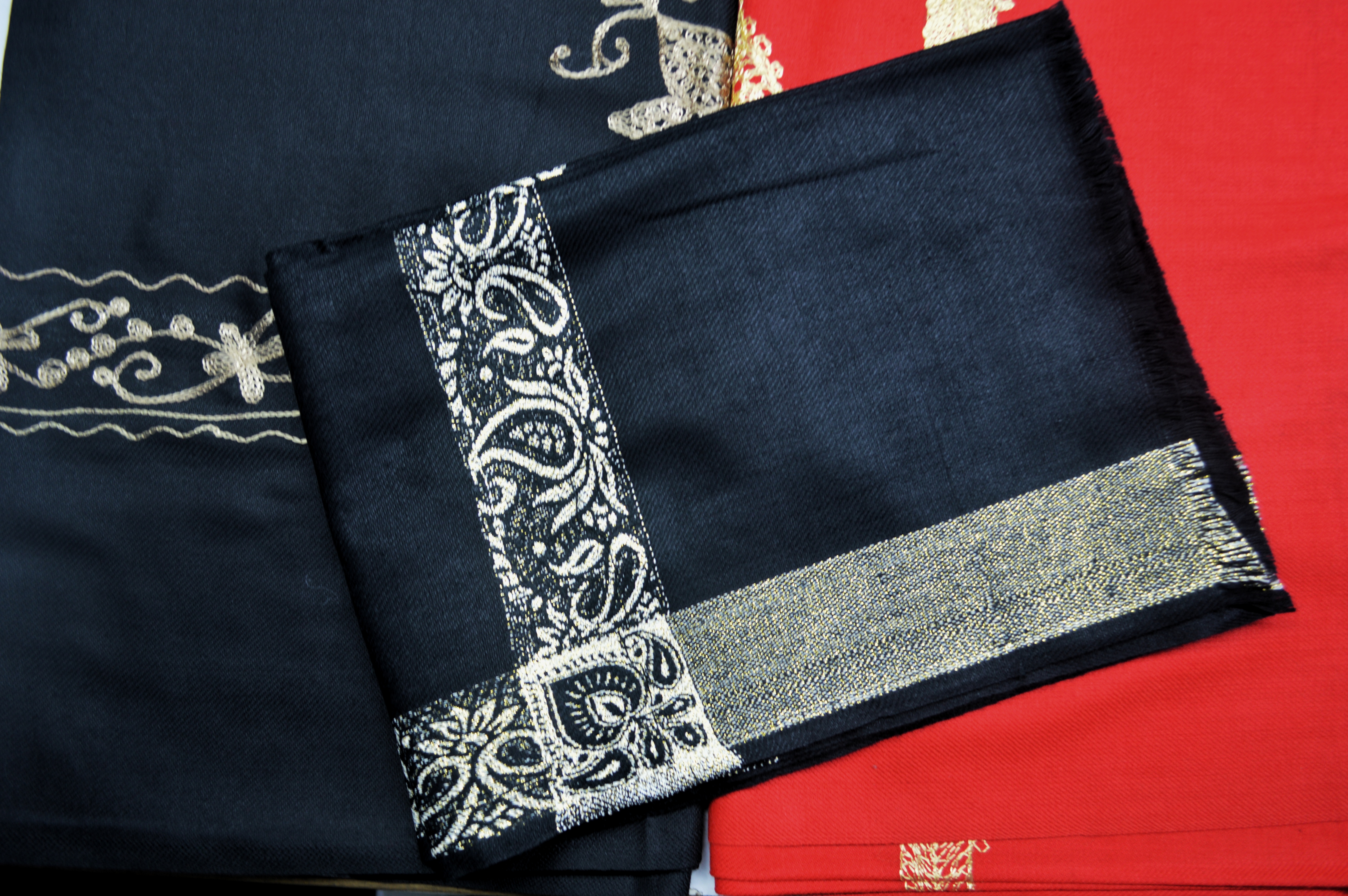 Black shawl with gold and silver borders