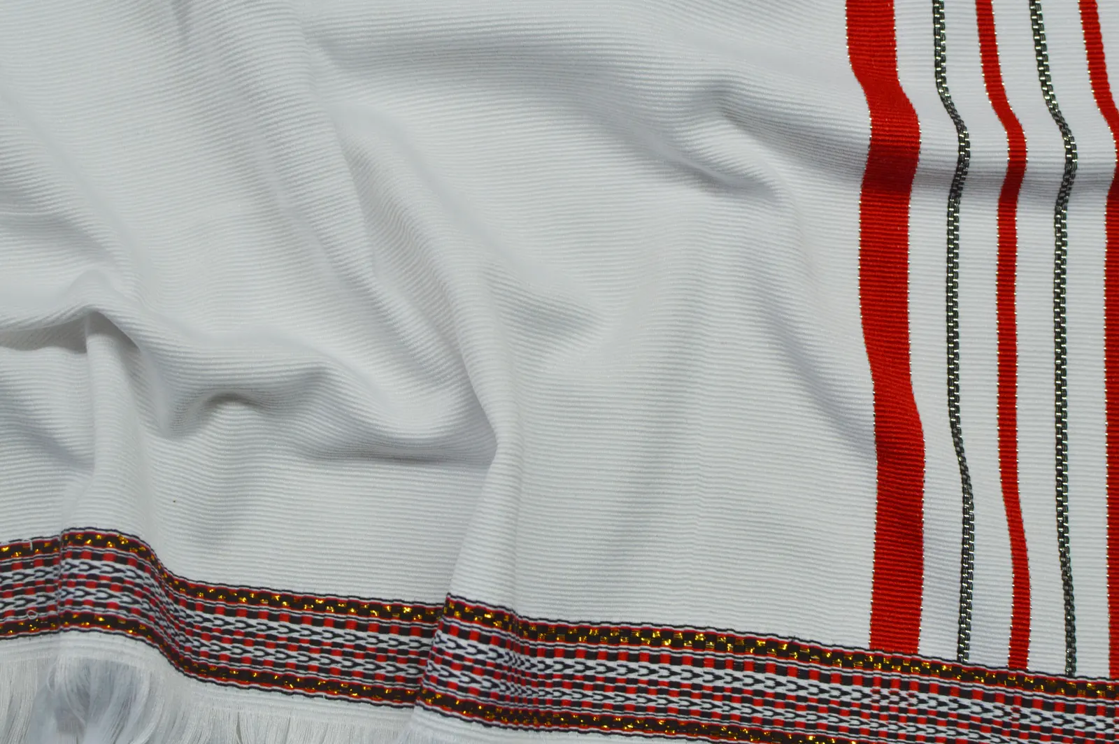 White sarong with bold red border detailing